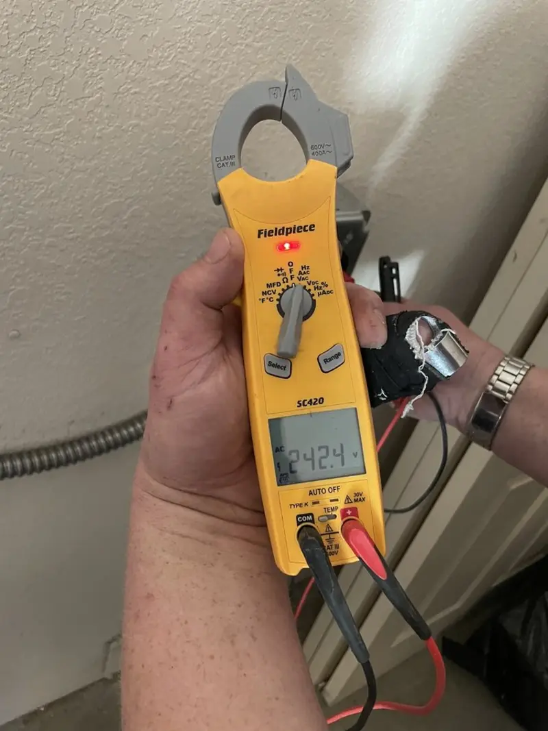Voltage testing with clamp meter during Generator Installation in Edna